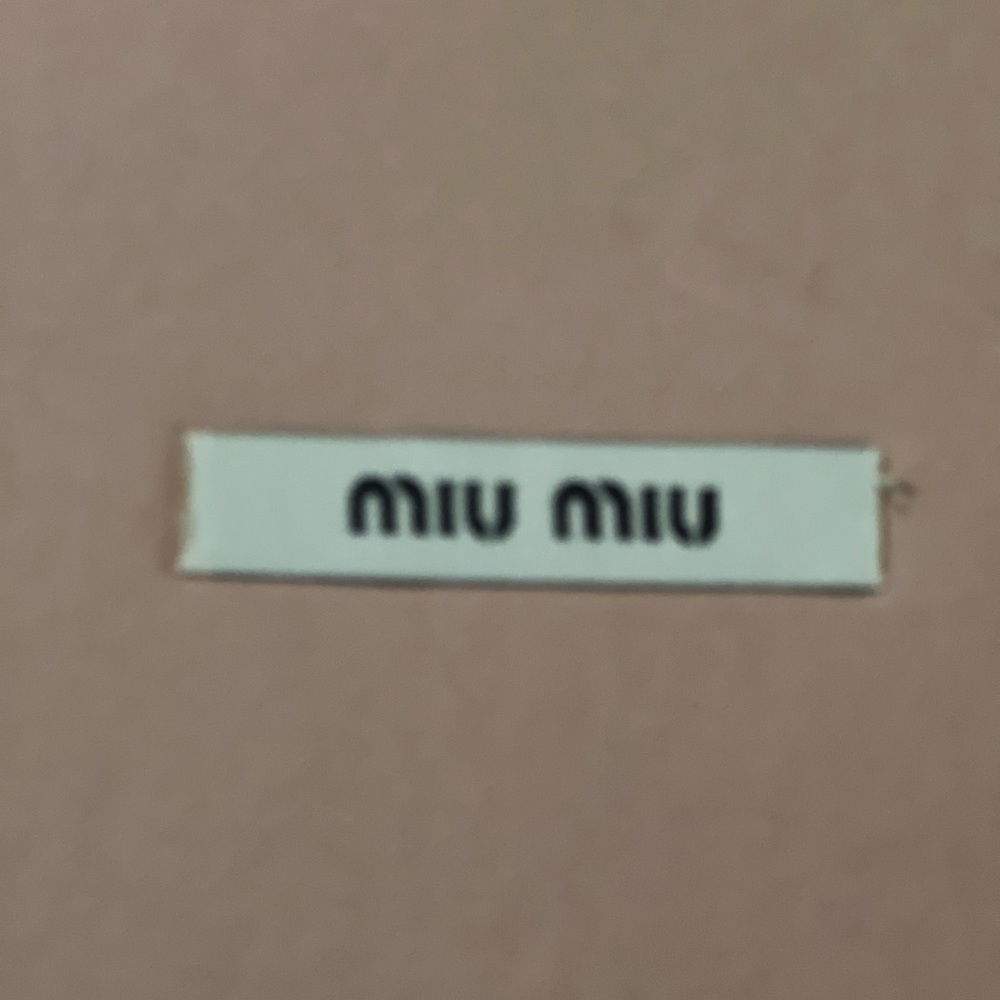 Miu Miu Red Long wallet zip 3/4. Looks new everything works well.